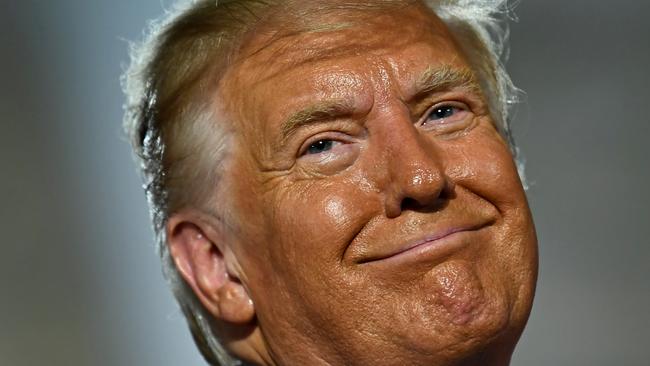 US President Donald Trump looks on after delivering his acceptance speech for the Republican Party nomination for reelection during the final day of the Republican National Convention at the South Lawn of the White House in Washington, DC on August 27, 2020. (Photo by Brendan Smialowski / AFP)