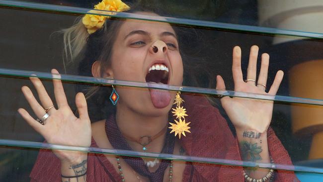 Paris Jackson presses herself up against the window of the Myer Marquee. Picture: Stuart McEvoy