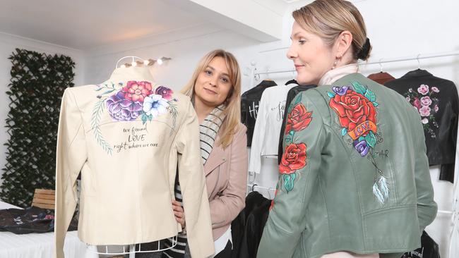 Hide and Rose started by GC born and raised Efthimia Devaney sell’s leather jackets and use Gold Coast artists, including Sharon Hindle, to hand-paint designs. Photo by Richard Gosling