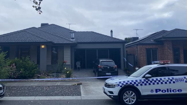 Police outside the Craigieburn home where a man was fatally stabbed on Saturday night. Picture: Euan Kennedy