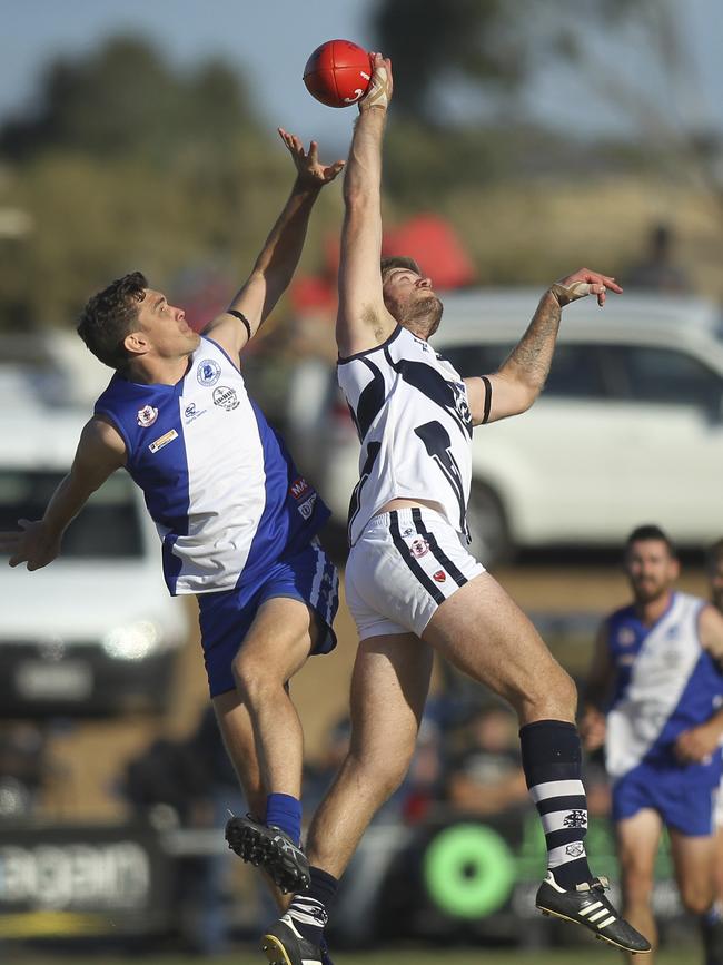 Noarlunga's Nathan Schulz (right) has been a powerhouse in the ruck for the Shoes this season. Picture: AAP /Dean Martin