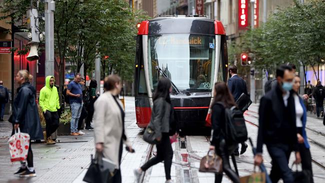 George Street in the Sydney CBD as morning commuters head for their workplaces. around 8am. Office worker numbers in the CBD on the rise. Picture: NCA NewsWire / Damian Shaw