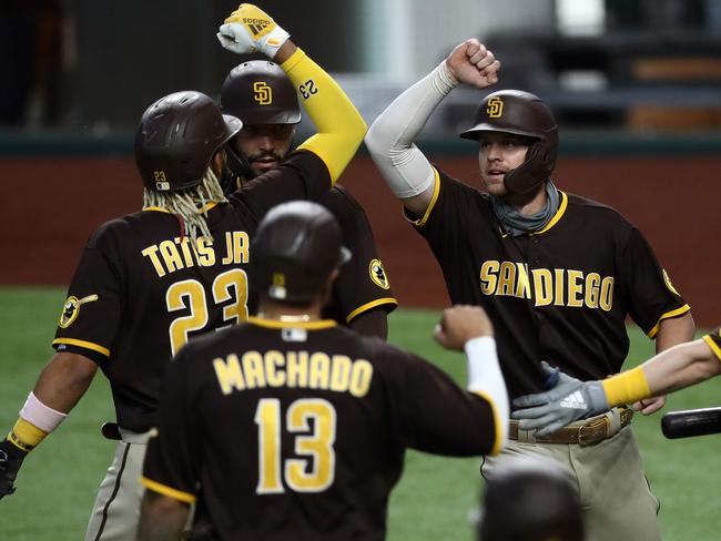 The Padres celebrate the grand slam. Picture: Ronald Martinez/Getty Images/AFP