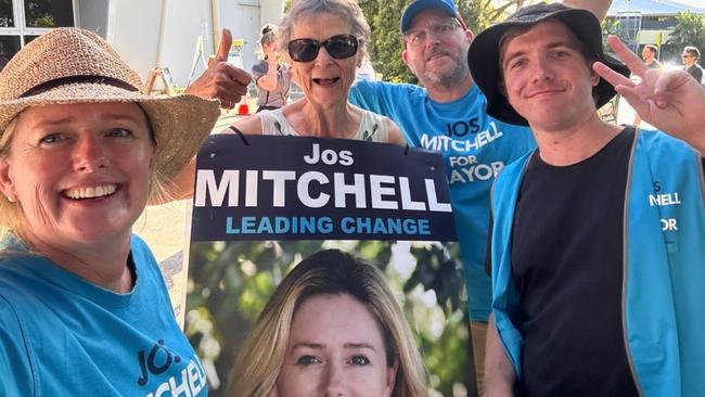 Mayoral candidate Jos Mitchell (left, pictured with supporters at Cleveland booth). NO ONE DEPICTED IN THIS IMAGE IS ACCUSED OF ANY WRONGDOING