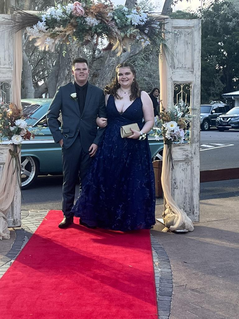 Shaina Cooke and Caleb Sten arrive at the Hervey Bay High School formal.