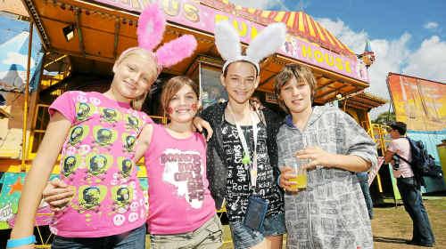 Holly Knight, Jaimee Morse, Hayley Fox and Matthew Milford enjoy the fun and games at a previous Gin Gin Show. Debate has begun about whether to change the show holiday that coincides with the Gin Gin Show. Picture: Max Fleet