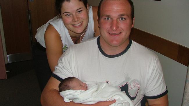 Michael Weyman holding his baby nephew Valentinoi Guseli.