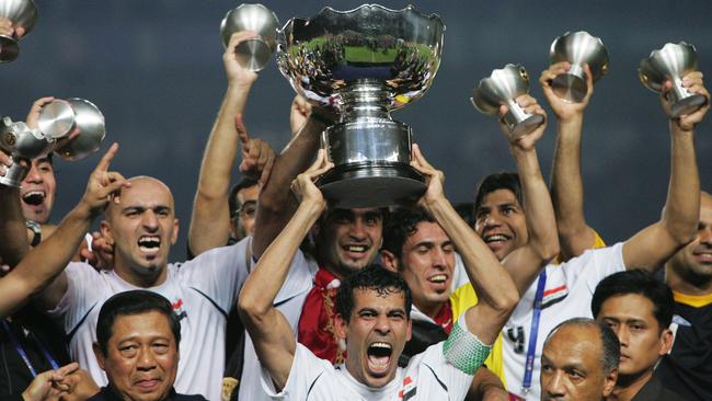 Younis Khalef holding the 2007 Asian Cup trophy.