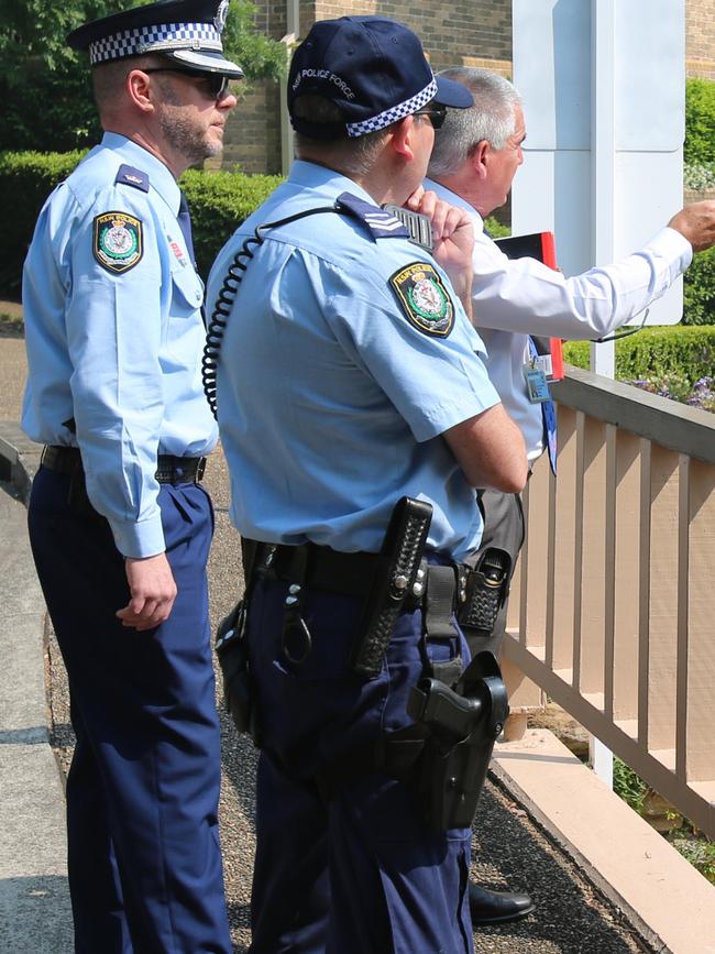 Police at the Bobbin Head Road home. Pictures: NSW Police