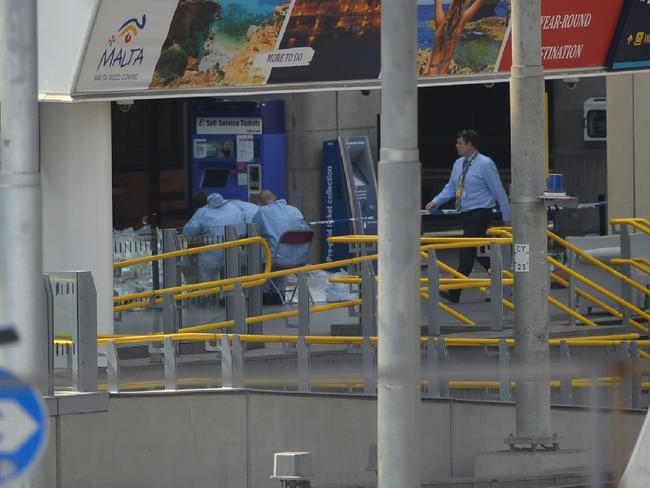 Forensics officers work at the scene at Manchester’s Victoria railway station in the city’s centre on Tuesday. Picture: AFP/Ben Stansall