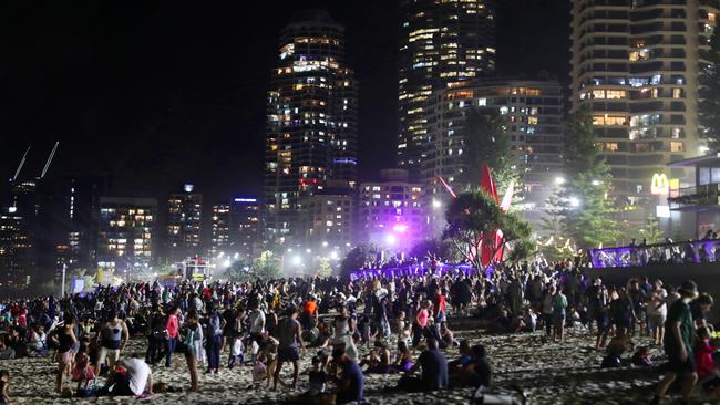 Revellers gather for the fireworks displays at Surfers Paradise. Picture: NIGEL HALLETT