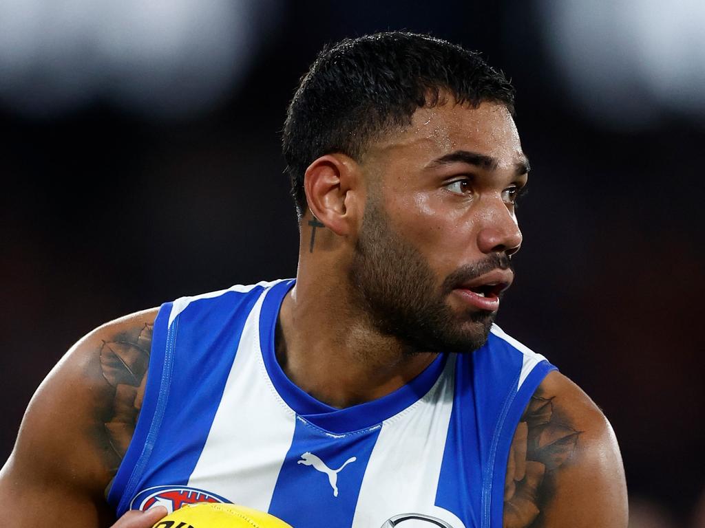 MELBOURNE, AUSTRALIA – AUGUST 12: Tarryn Thomas of the Kangaroos in action during the 2023 AFL Round 22 match between the North Melbourne Kangaroos and the Essendon Bombers at Marvel Stadium on August 12, 2023 in Melbourne, Australia. (Photo by Michael Willson/AFL Photos via Getty Images)