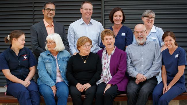 Families of COVID victims, second from left, Sandi Todd, Elisabetta Ferraro, Veronica Leaney and Steve Lavender with medical staff Tamlyn Dell’Oro, Krish Sundararajan, Alex Wurm, Lisa Kiddy, Mandy Kocher and Amanda McClure at the RAH. Picture Matt Turner.