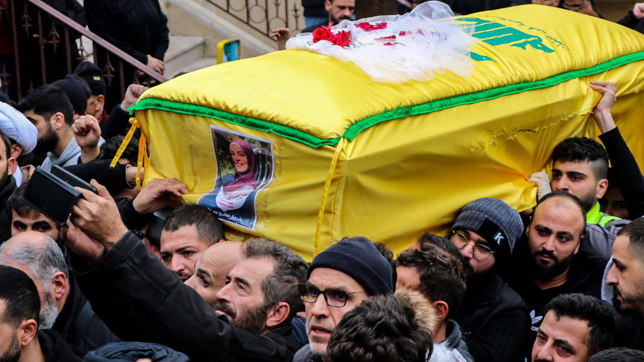 Mourners carry the coffin of Shorouq Hammoud. Picture: AFP.