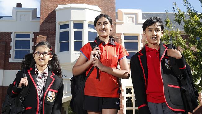 Ballarat Clarendon College students Hana, Hema and Harry Bains outside the college. Picture: Yuri Kouzmin