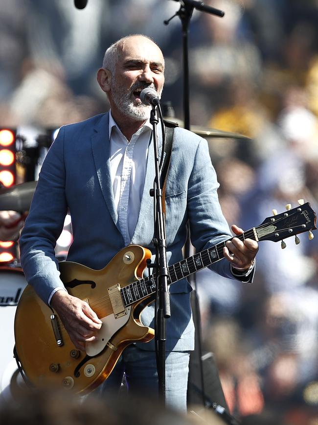 Paul Kelly performs before the 2019 AFL Grand Final. Picture: RYAN PIERSE/AFL MEDIA/VIA GETTY IMAGES