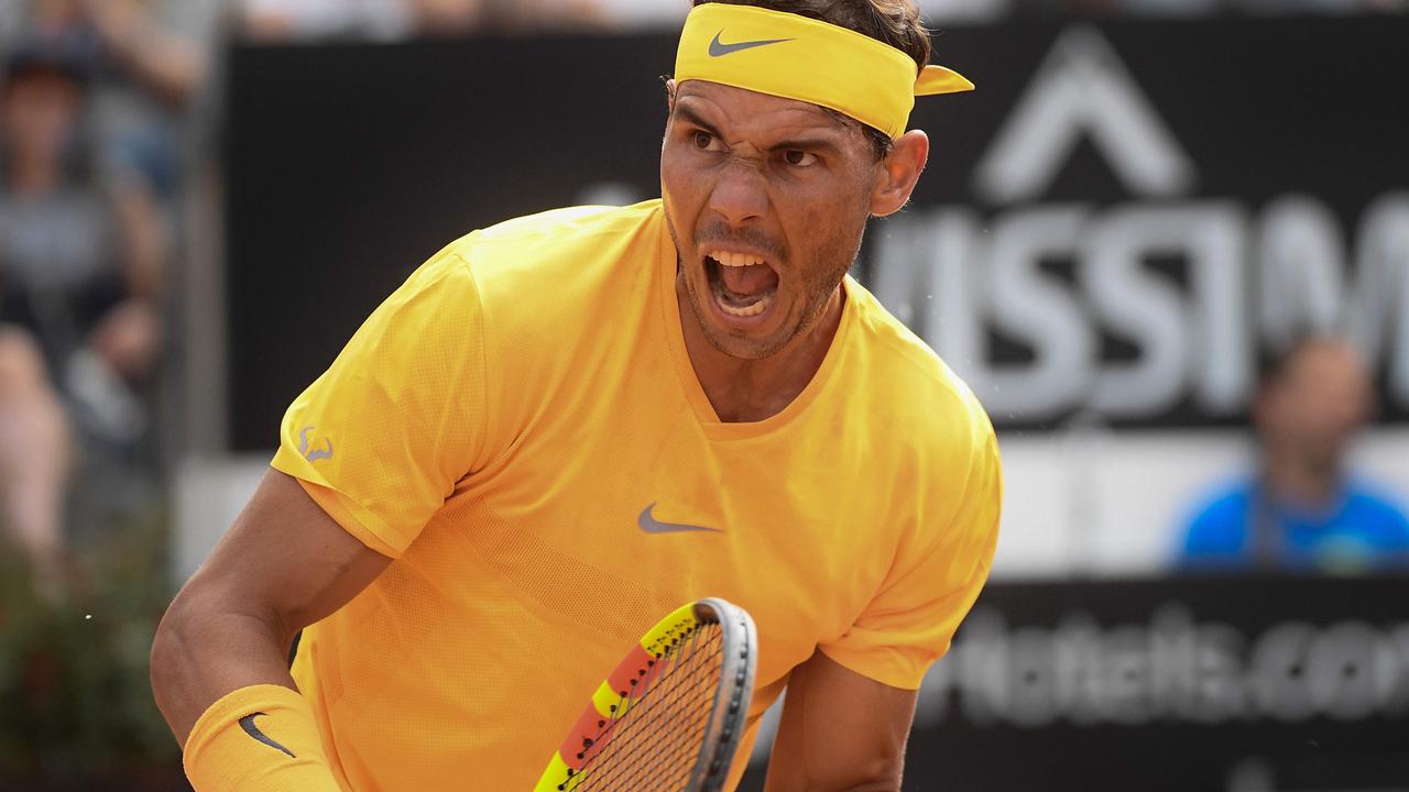 Spain's Rafael Nadal reacts during the Men's final against Germany's Alexander Zverev at Rome's ATP Tennis Open tournament at the Foro Italico, on May 20, 2018 in Rome. / AFP PHOTO / Filippo MONTEFORTE