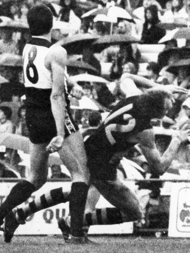 Cornes goes to ground after the hit. Picture: Tony Lewis)