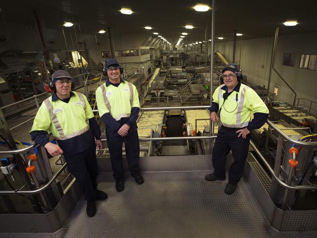 GROWING: Production manager Tony Griffiths, left, process area manager Jason Spinks and process area operator Michael Tummon at the Simplot factory at Ulverstone. Picture: CHRIS KIDD