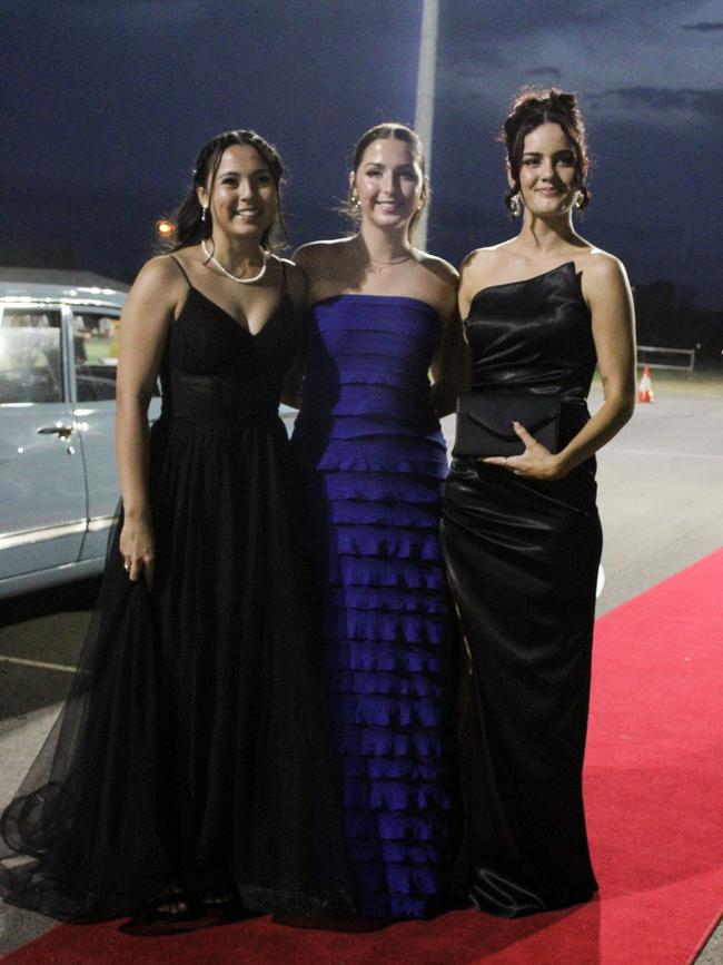 Kylie Brislane, Tayla Holloway and Lillian Robertson at the 2023 Kepnock State High School formal.