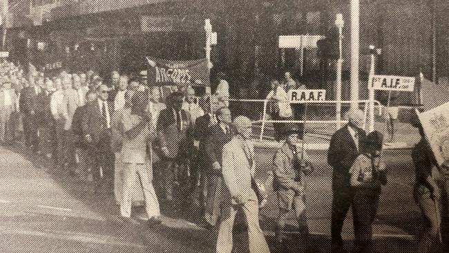 World War I and World War II veterans march in Southport. April 25, 1985