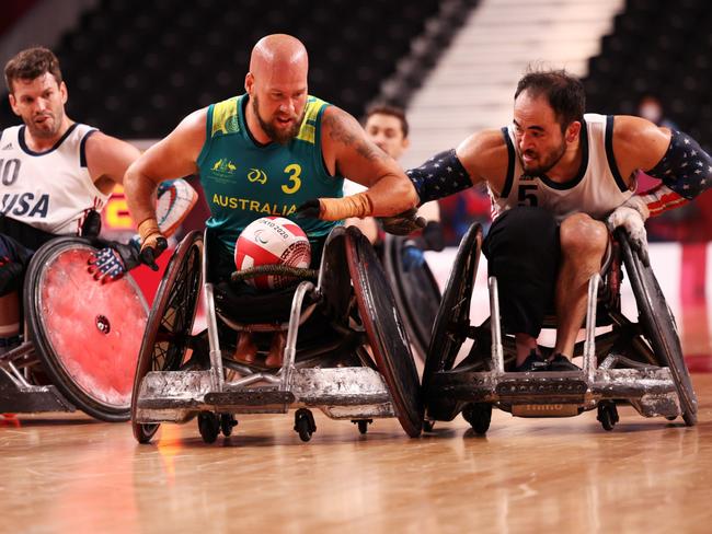 Charles Aoki of Team United States (right) challenges Ryley Batt of Team Australia (left) during the Wheelchair Rugby semi final at the Tokyo 2020 Paralympic Games. Picture: Adam Pretty/Getty Images