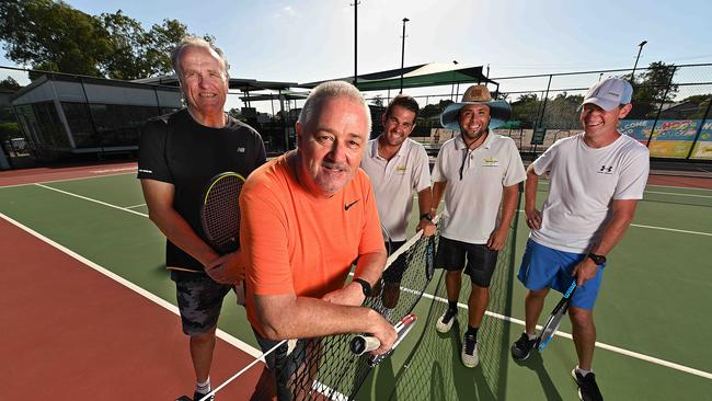 Brisbane coach Clive Martin, who toured the world playing tennis, with a group of friends who revived him after he suffered a heart attack Picture: Lyndon Mechielsen