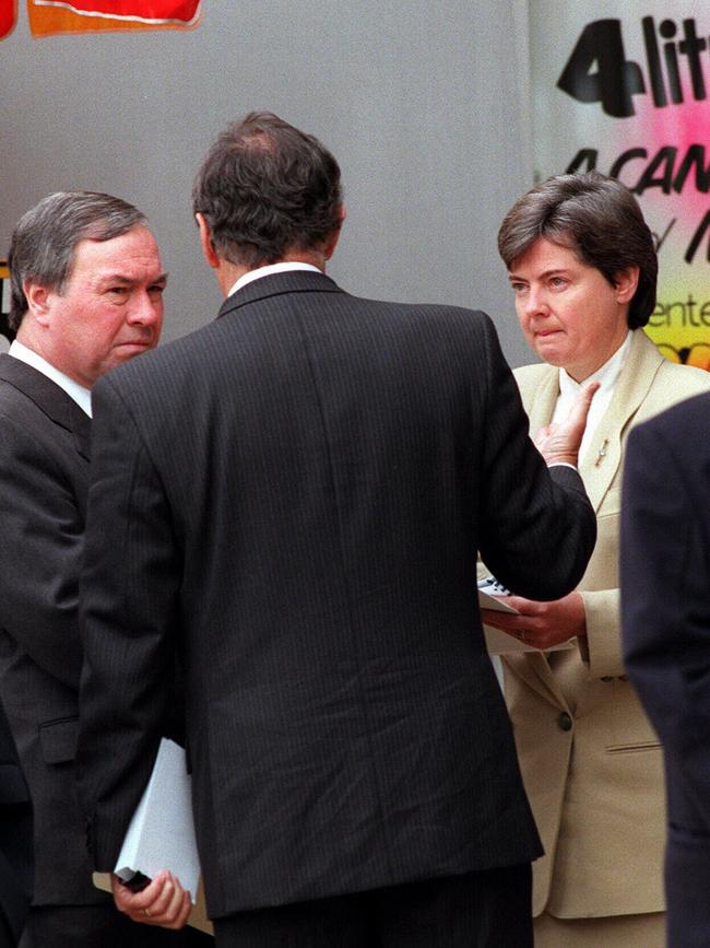 SA judge Bruce Lander with lawyers Michael David and Ann Vanstone during court visit to service station robbery shooting scene in 1996.