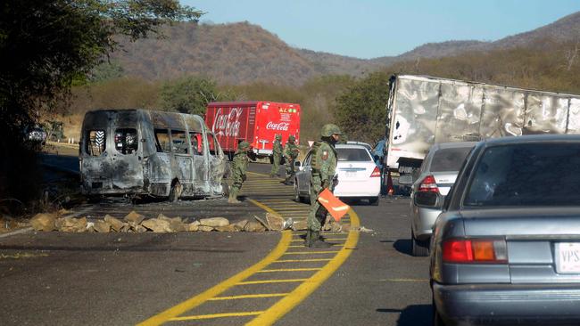 Guzman’s extradition to the US was halted, as locals and law enforcement clean up the mess in Culiacan. Picture: Juan Carlos Cruz / AFP