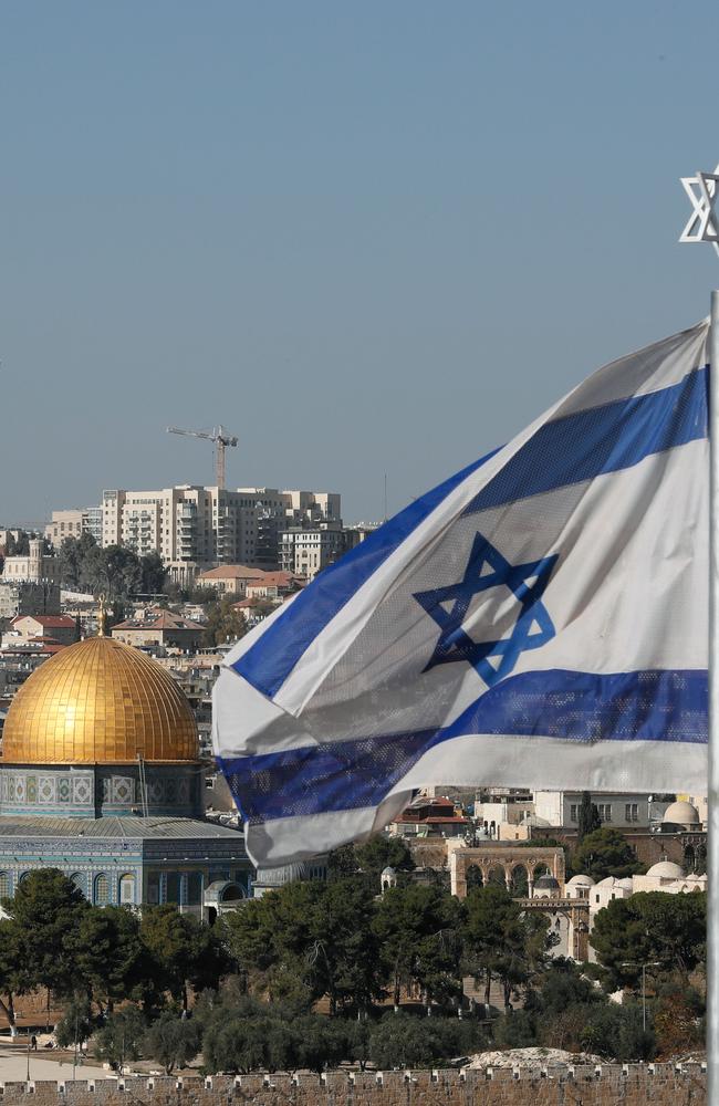 The Israeli flag flutters in front of the Dome of the Rock in Jerusalem. Picture: AFP/Thomas Coex