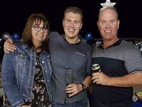 Senior Constable David (Dave) Masters was tragically killed overnight on the Bruce Highway trying to stop a stolen vehicle. Dave pictured with wife Sharon and son Jack. Image supplied by Queensland Police Union