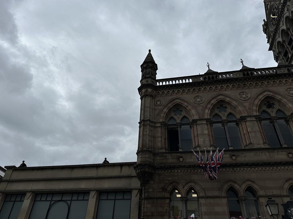 Officers lined the rooftops across from the cathedral. Picture: Bronte Coy