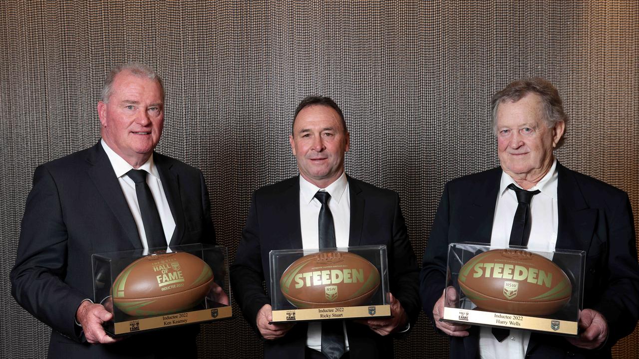 NSWRL Hall of Fame Inductee Ricky Stuart pictured (centre) with Craig Young (left), accepting the award for Ken Kearney, and John Elford (right) accepting for Harry Wells, at the True Blues Dinner. Picture: Damian Shaw