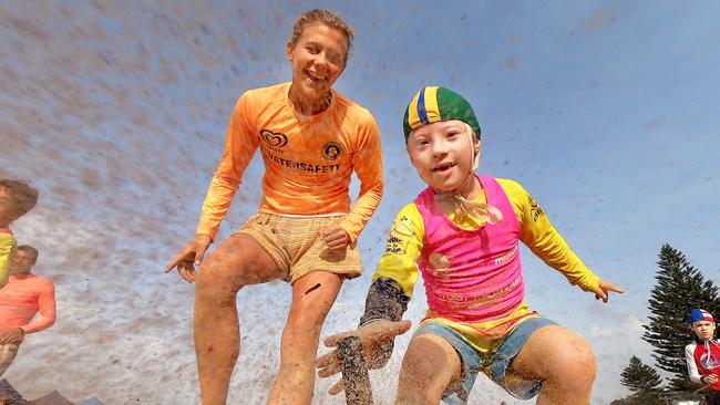 Avoca competitor Oren Barlow, 6, participates in the beach flags event at the Surf Life Saving Central Coast Inclusive Branch Carnival. Picture: Troy Snook