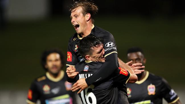 Nick Fitzgerald celebrates after he equalised in the second half for the Jets.