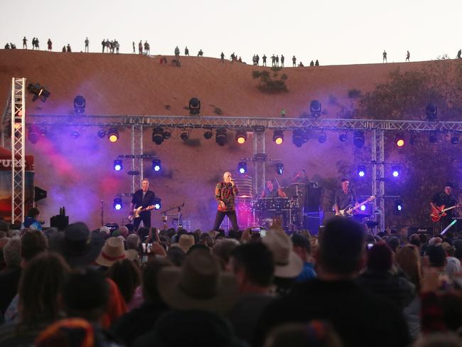 18/07/2019: Midnight Oil close the The worlds most remote music festival the Big Red Bash , at the base of the Big Red sand dune, west of Birdsville, QLD. Lyndon Mechielsen/The Australian