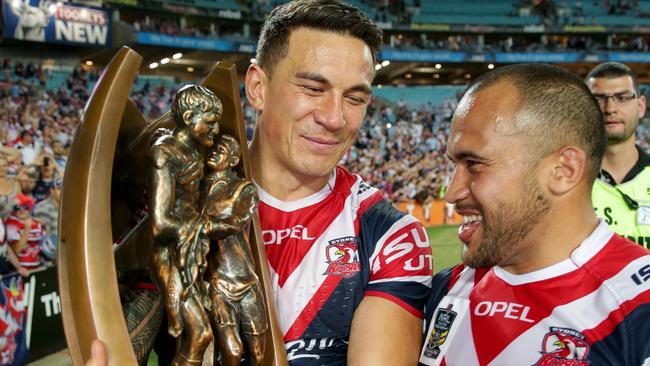 Rooster's Sonny Bill Williams celebrates the 2013 grand final win with Sam Moa.