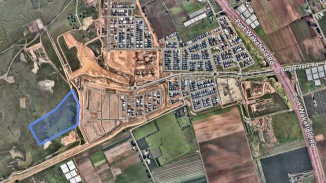 The blue outline shows the community land that would be turned into sportsgrounds and shared with the proposed Catholic school in the plan for Riverlea Park. Picture: City of Playford,