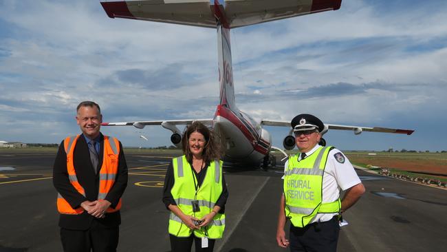 Dubbo Mayor Ben Shields, airport manager Jacki Parish and RFS preparedness area operations manager Paul Whiteley on the new apron at Dubbo City Regional Airport. Picture: Ryan Young