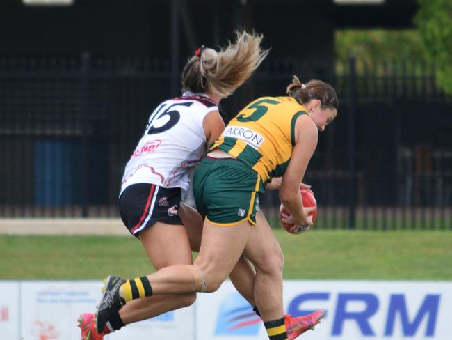 Bella Clarke injures her shoulder against PINT in Round 8. Picture: AFLNT Media.