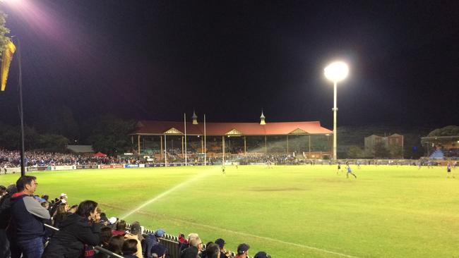 It may not have been raining goals at The Parade on Friday night, but the enthusiasm of the crowd was far from dampened when the sprinklers came to life. Picture: Bob Neil