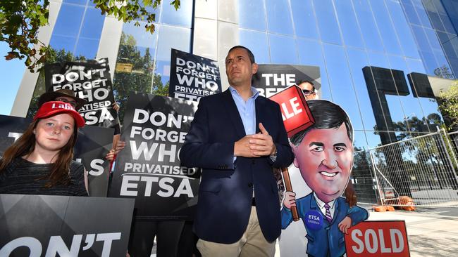 Treasurer Tom Koutsantonis outside SA Power Networks. Picture: AAP / David Mariuz