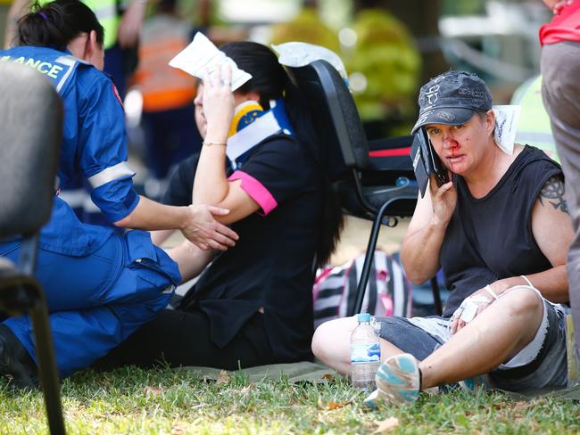 Injured passengers at the scene of today’s collision. Picture: Dylan Robinson