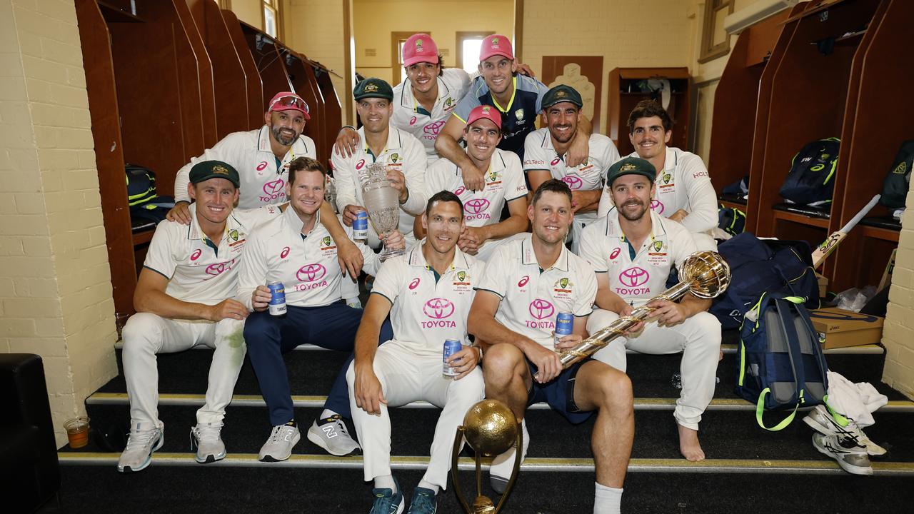 Australia celebrate with the Ashes trophy, Border Gavaskar Trophy and the World Test Championship mace. (Photo by Darrian Traynor/Getty Images)