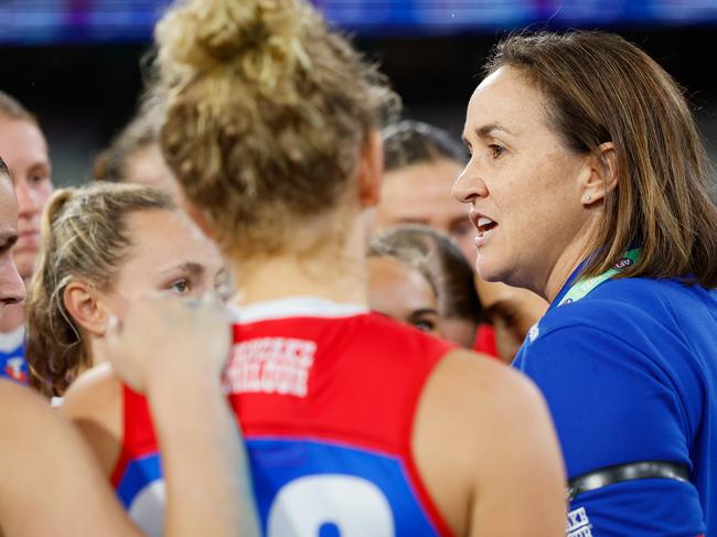 MELBOURNE, AUSTRALIA - SEPTEMBER 06: Tamara Hyett, Senior Coach of the Bulldogs addresses their players during the 2024 AFLW Round 02 match between the Western Bulldogs and the Port Adelaide Power at The Melbourne Cricket Ground on September 06, 2024 in Melbourne, Australia. (Photo by Dylan Burns/AFL Photos via Getty Images)