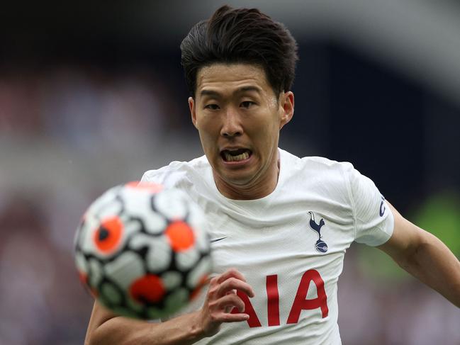 Tottenham Hotspur's South Korean striker Son Heung-Min chases the ball during the English Premier League football match between Tottenham Hotspur and Manchester City at Tottenham Hotspur Stadium in London, on August 15, 2021. (Photo by Adrian DENNIS / AFP) / RESTRICTED TO EDITORIAL USE. No use with unauthorized audio, video, data, fixture lists, club/league logos or 'live' services. Online in-match use limited to 120 images. An additional 40 images may be used in extra time. No video emulation. Social media in-match use limited to 120 images. An additional 40 images may be used in extra time. No use in betting publications, games or single club/league/player publications. /