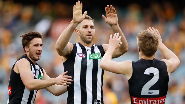 Travis Cloke celebrates a goal in his final game at Collingwood.