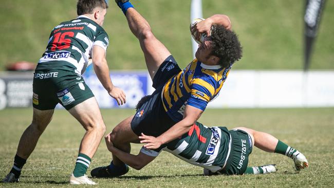 What a tackle. Charlie Blank up-ends Sydney Uni player Nathan Fua