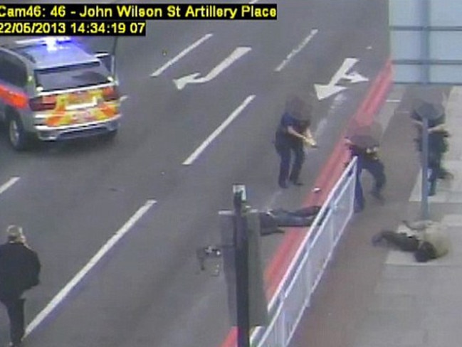 Michael Adebolajo, 28, and Michael Adebowale, 22, on the ground after the attack.