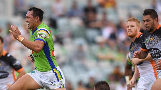 Jordan Rapana runs to score a try against the Tigers.